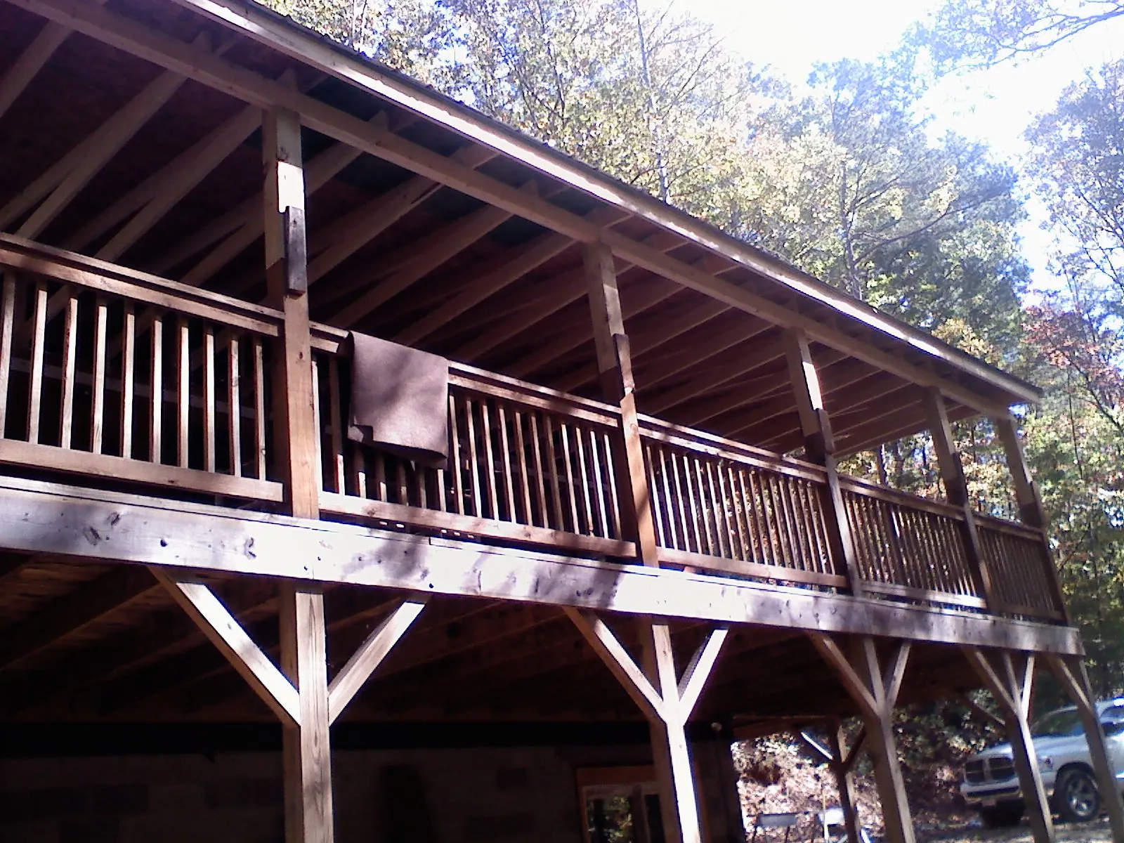 Timber framing under a new elevated porch and deck — Roof Leak Repair in Hanska by Roofing Brothers